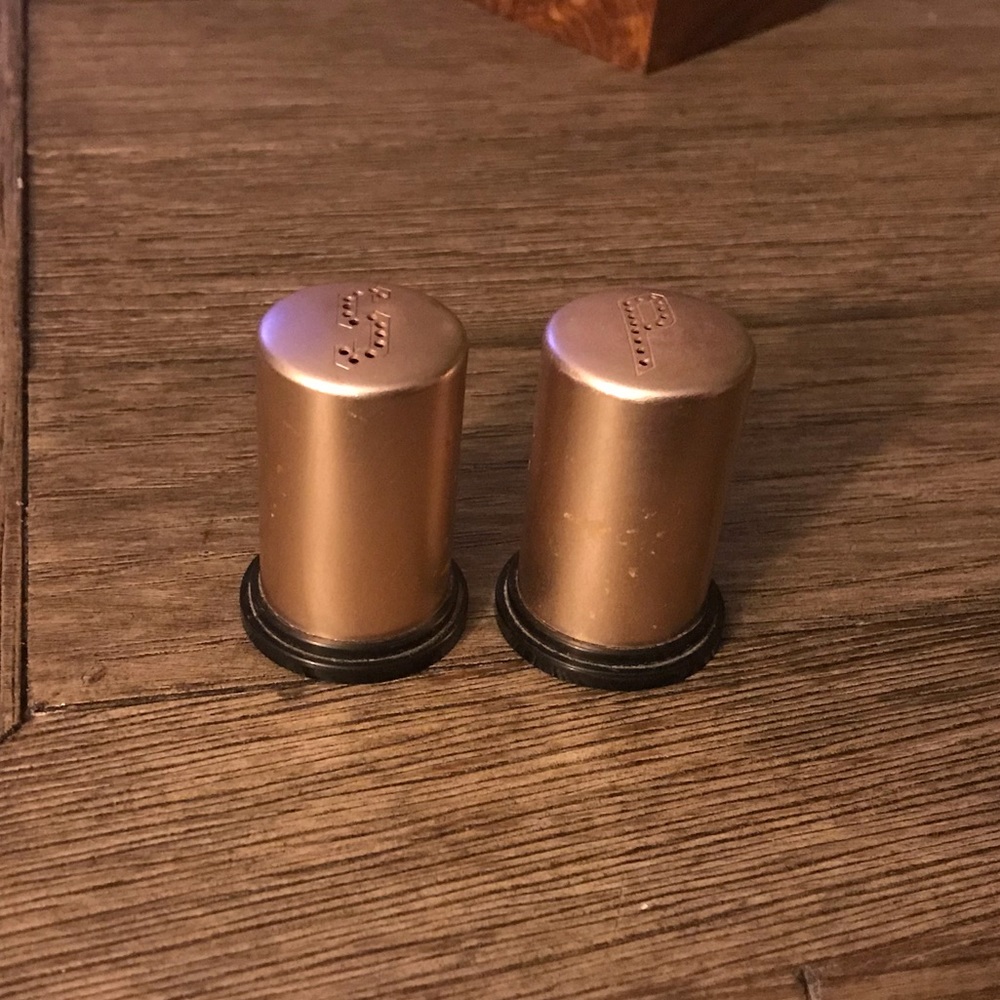 Vintage salt and pepper plastic shakers.